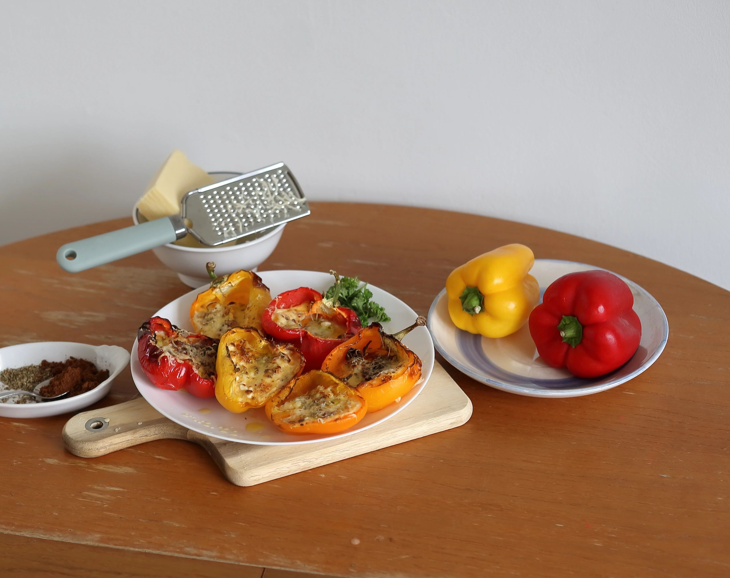 Colorful baked bell peppers filled with egg, cottage cheese, and leek